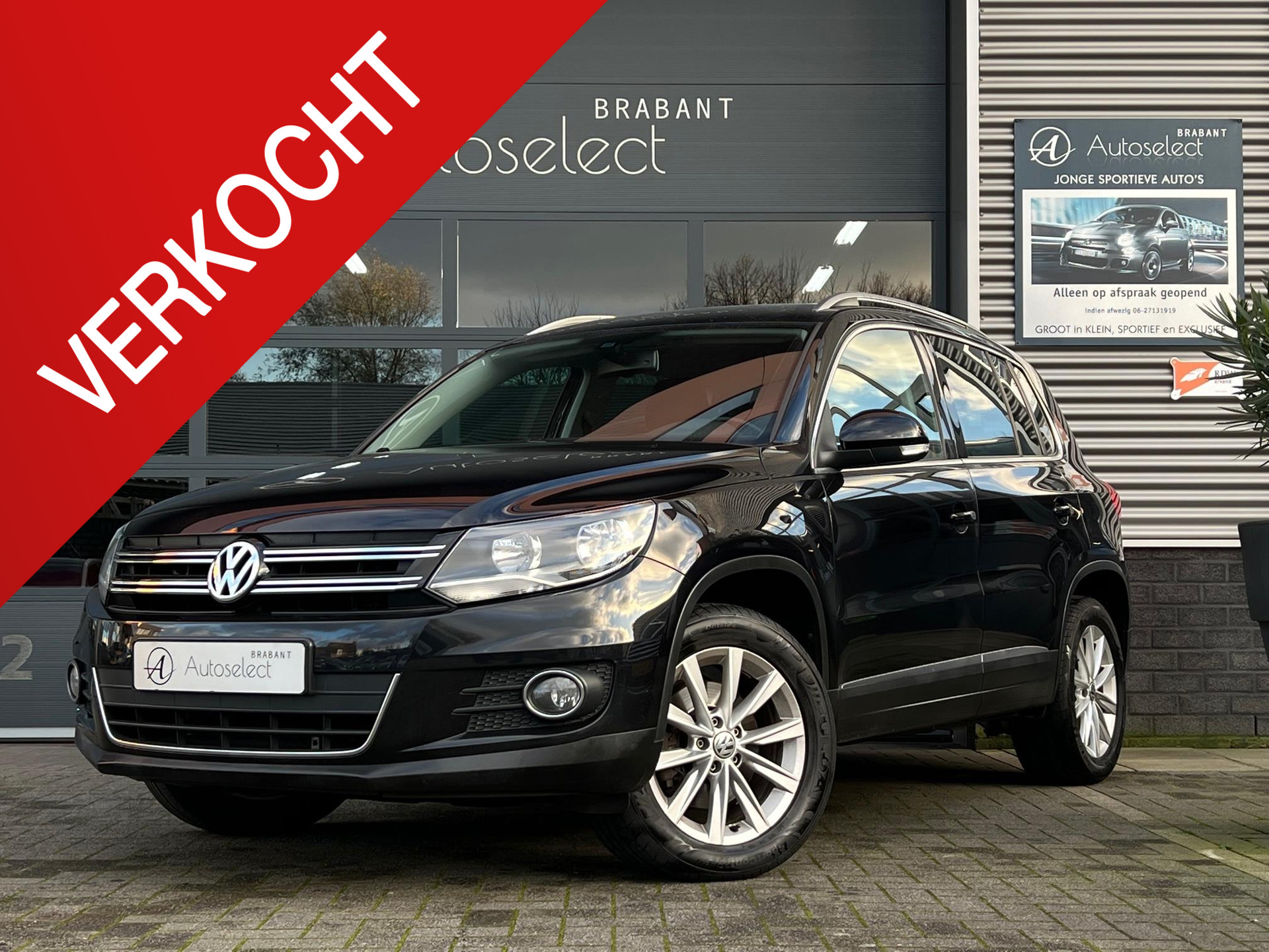 Volkswagen Tiguan 1.4 TSI Sport&Style 4Motion 36264774-0.jpg | Autoselect Brabant